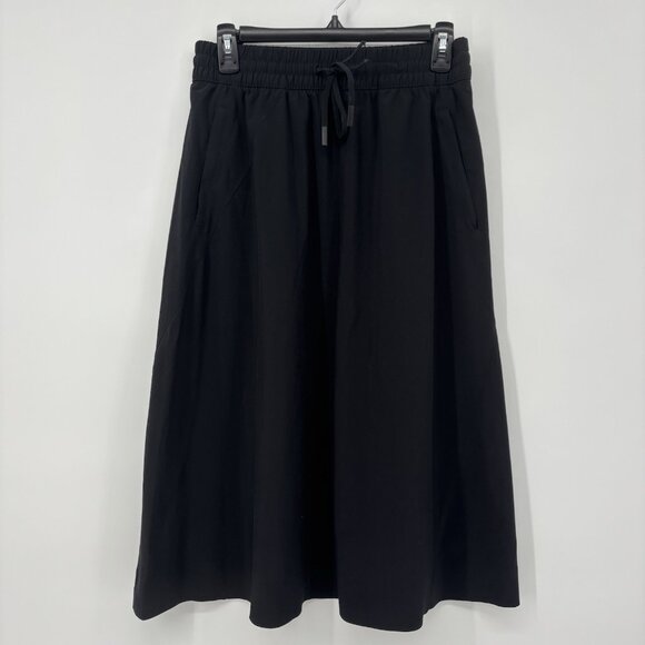 Athleta Dresses & Skirts - Athleta Arrival Midi Skirt Women’s Size 6 Black Athletic Drawstring Waist